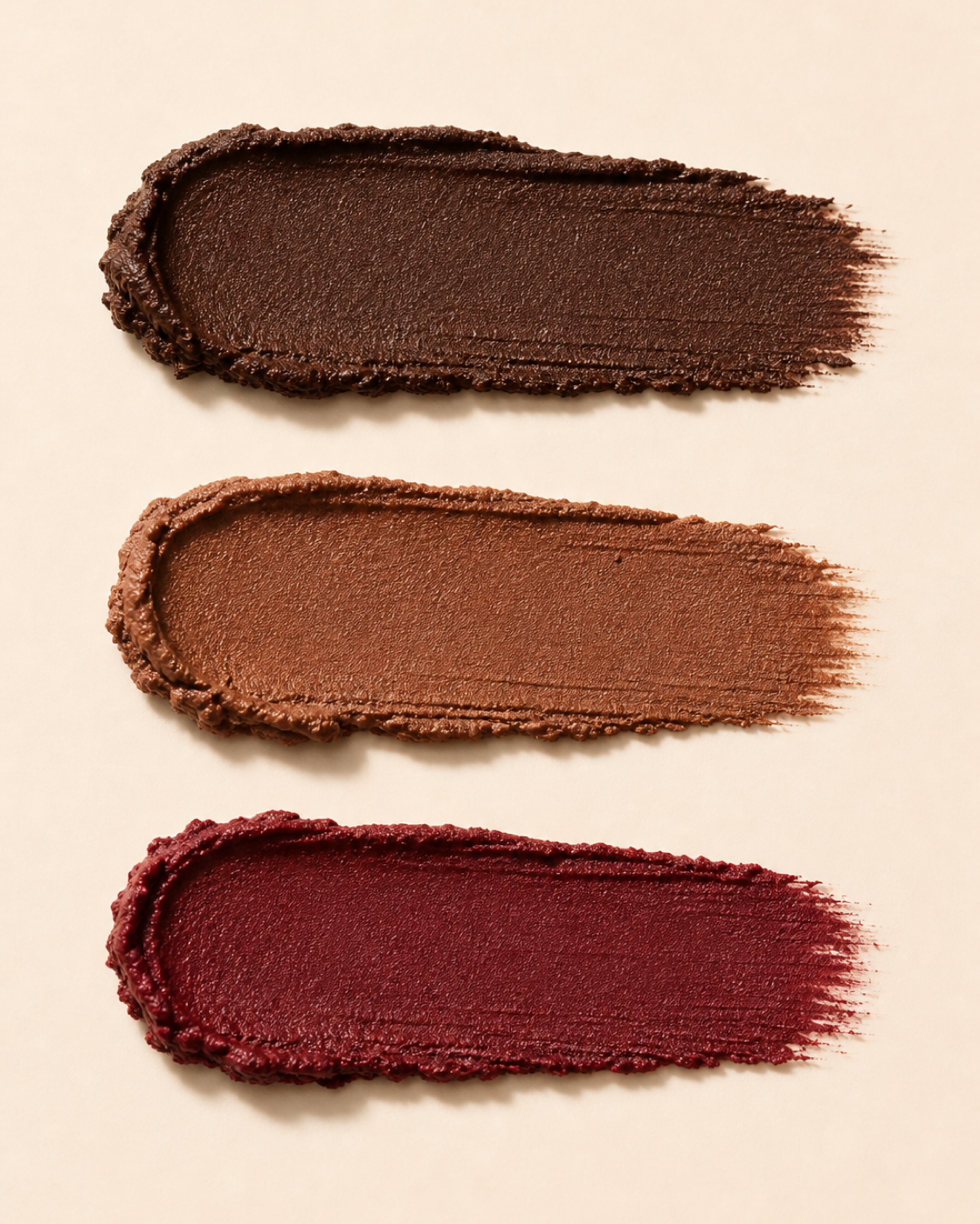 Light brown, dark brown and wine red lip liner swatches