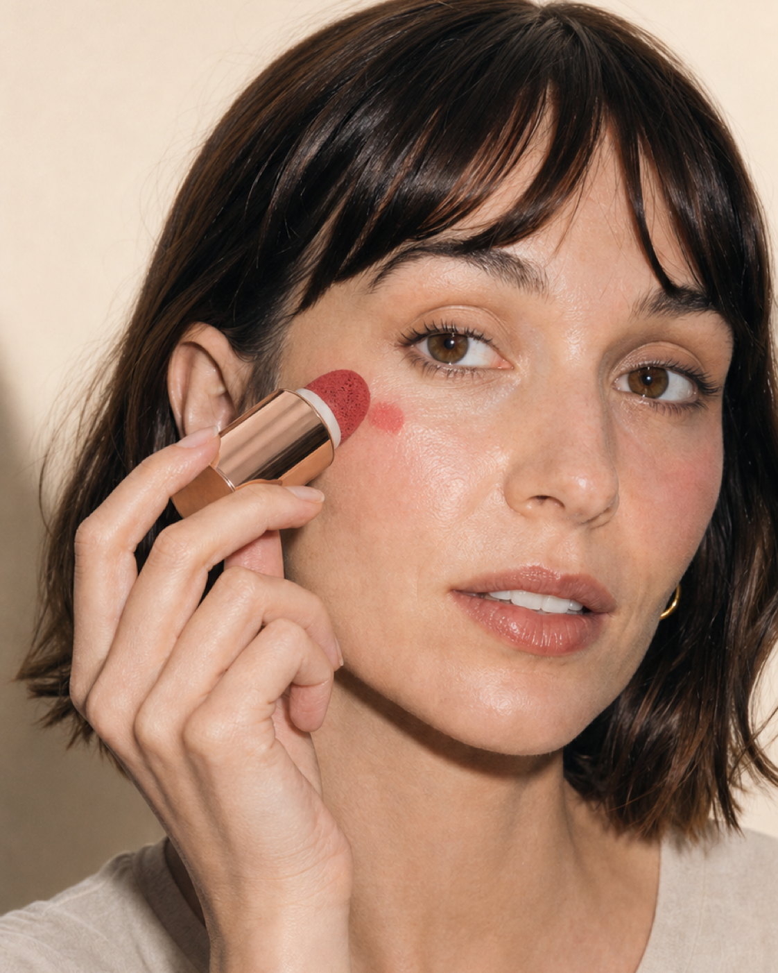 Mousse Blush being applied to the cheek